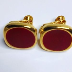 Red Trifari screw back earrings